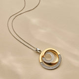 Sculptural Twisted Zirconia Necklace with pendant